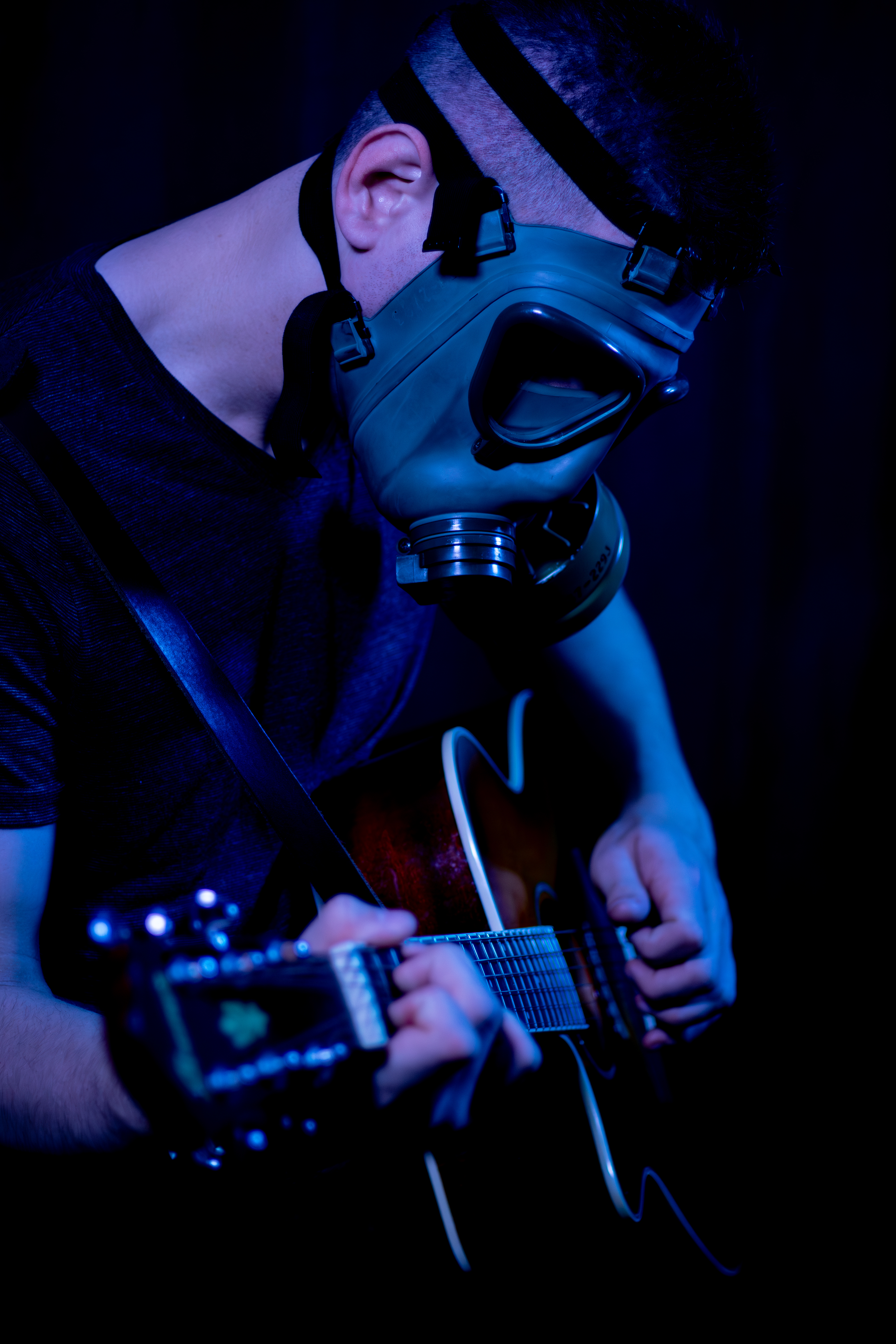 Sean Samarov pulling down a gas mask